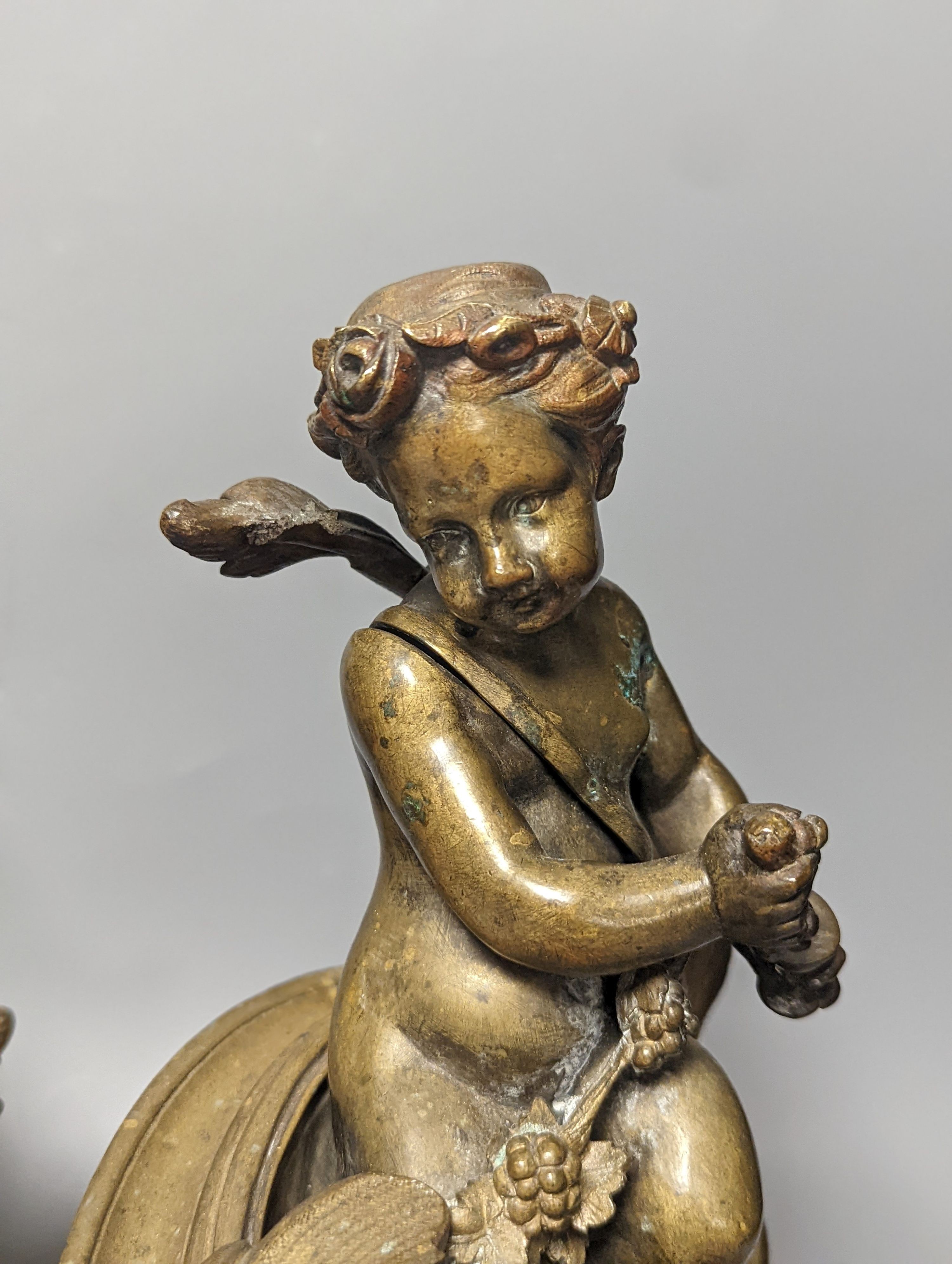 A pair of 19th century French bronze putti chenet 31cm